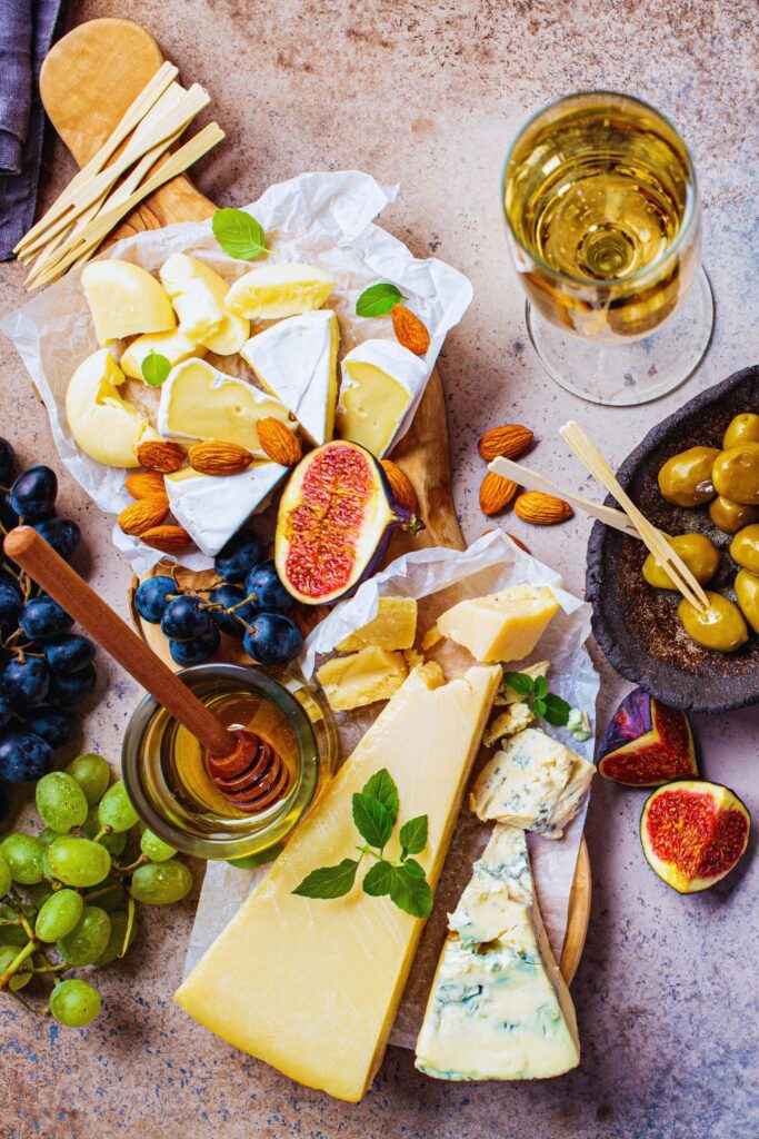 Gourmet cheese and wine board with figs, grapes, almonds, and honey served at Martha's Bed and Breakfast in Lincoln, Nebraska